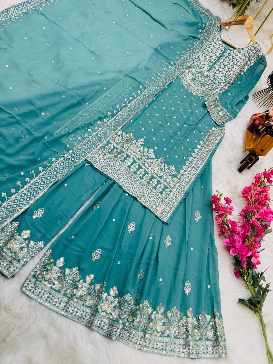 Demanding Sky Blue Color Georgette Sharara Suit