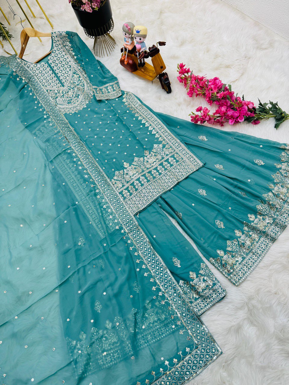 Demanding Sky Blue Color Georgette Sharara Suit