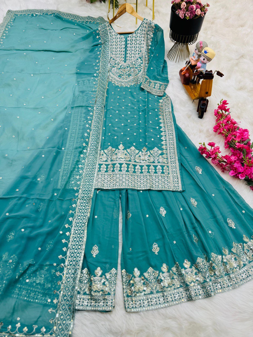 Demanding Sky Blue Color Georgette Sharara Suit