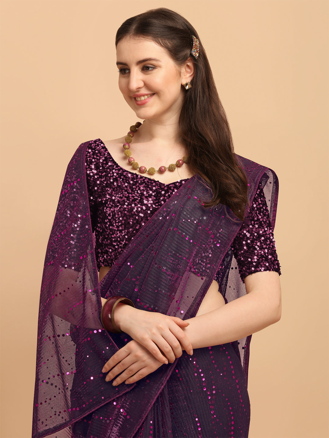 Demanding Pink Net Saree With Sequences Blouse