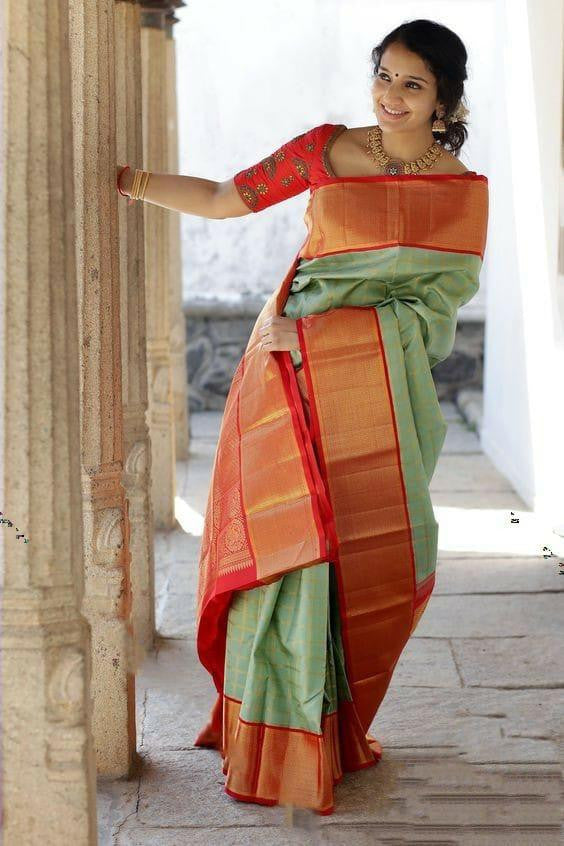 Innovative Aqua Green Color Soft Silk Saree