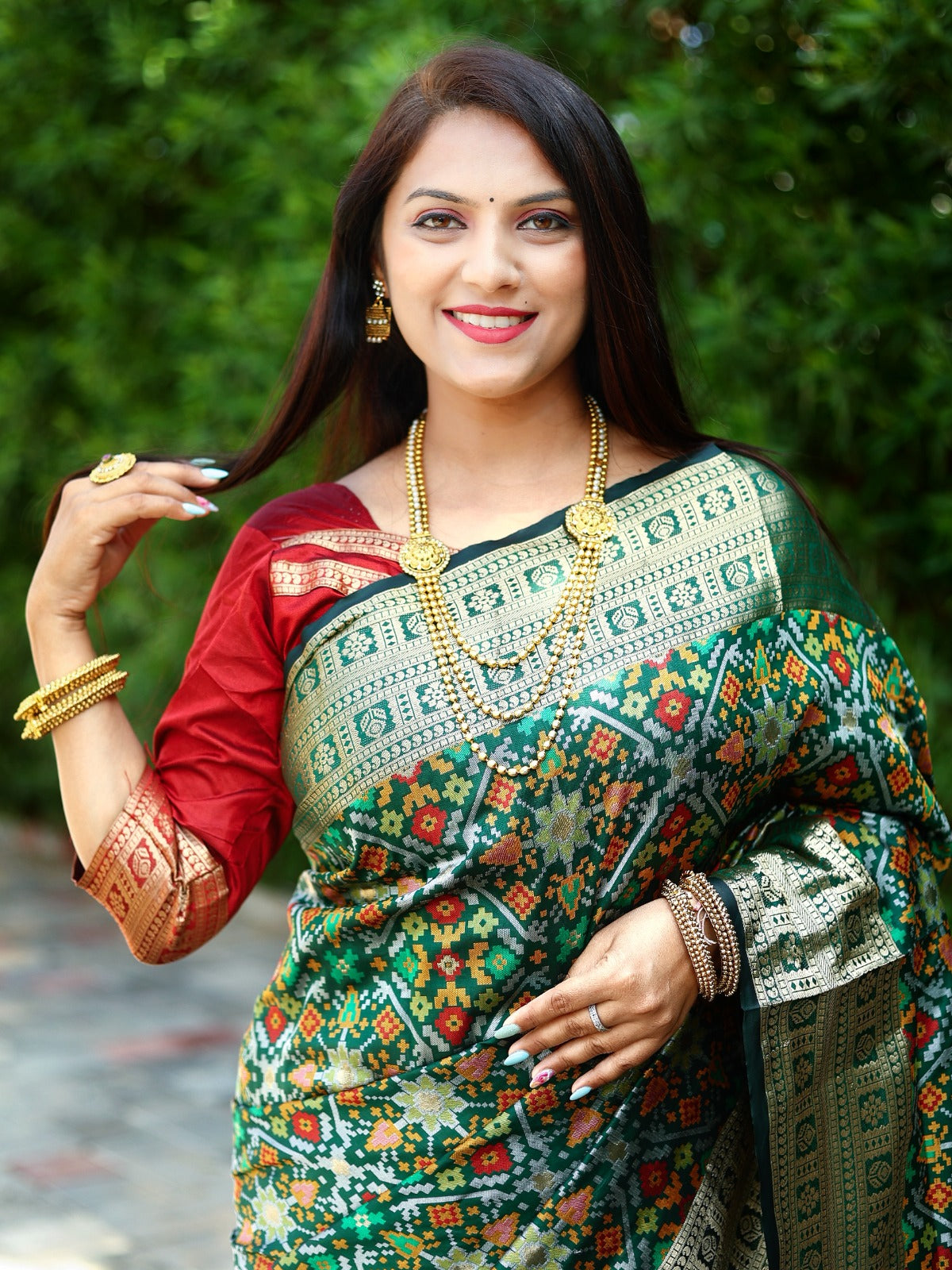 Fashionable Green Color All Over Zari Patola Weaving Saree