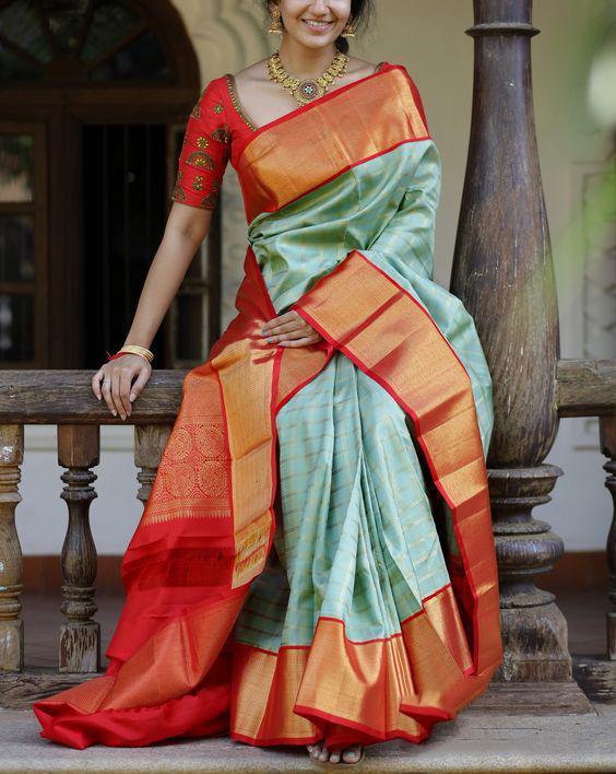 Innovative Aqua Green Color Soft Silk Saree