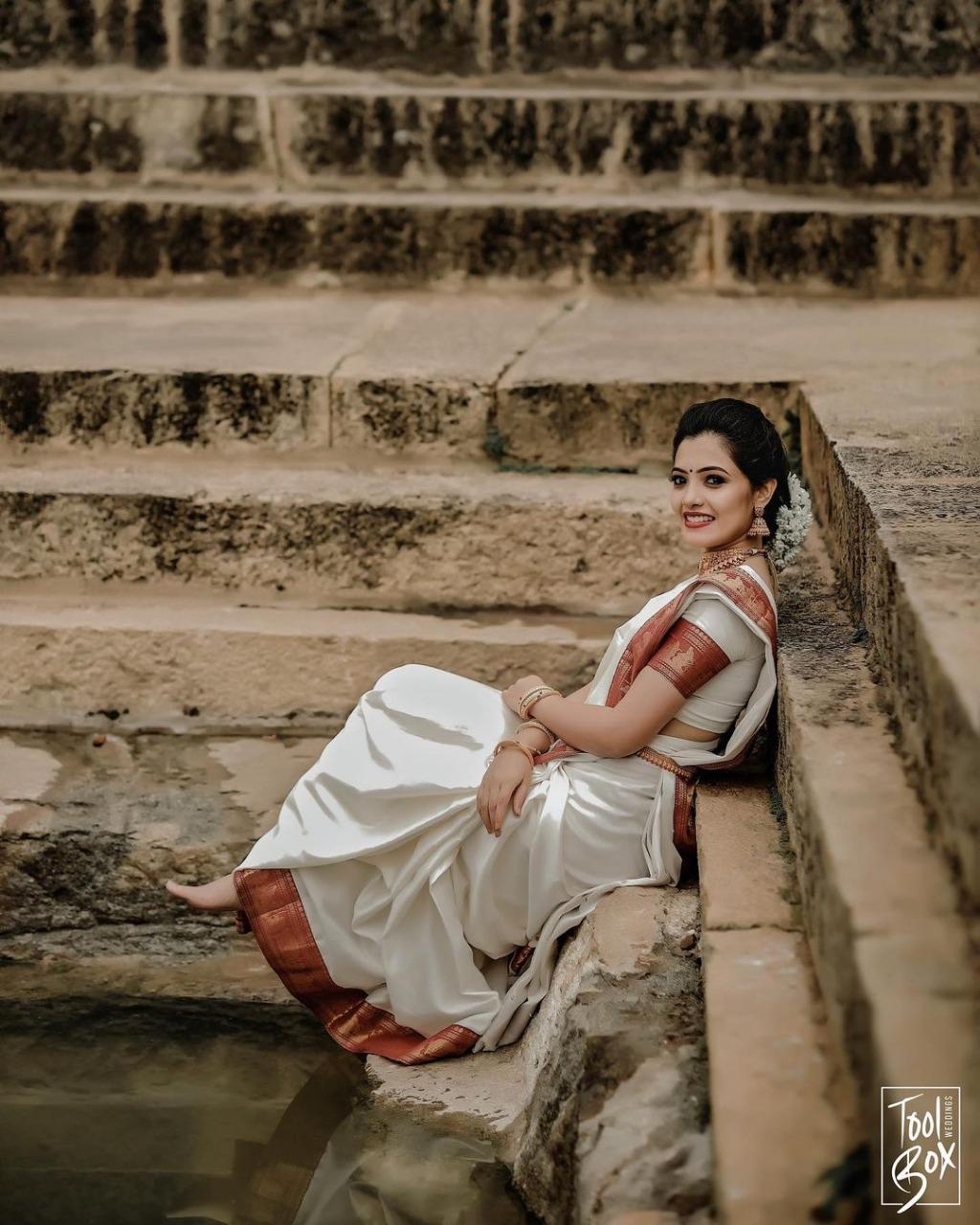 Opulent White Color Soft Lichi Silk Golden Zari Saree