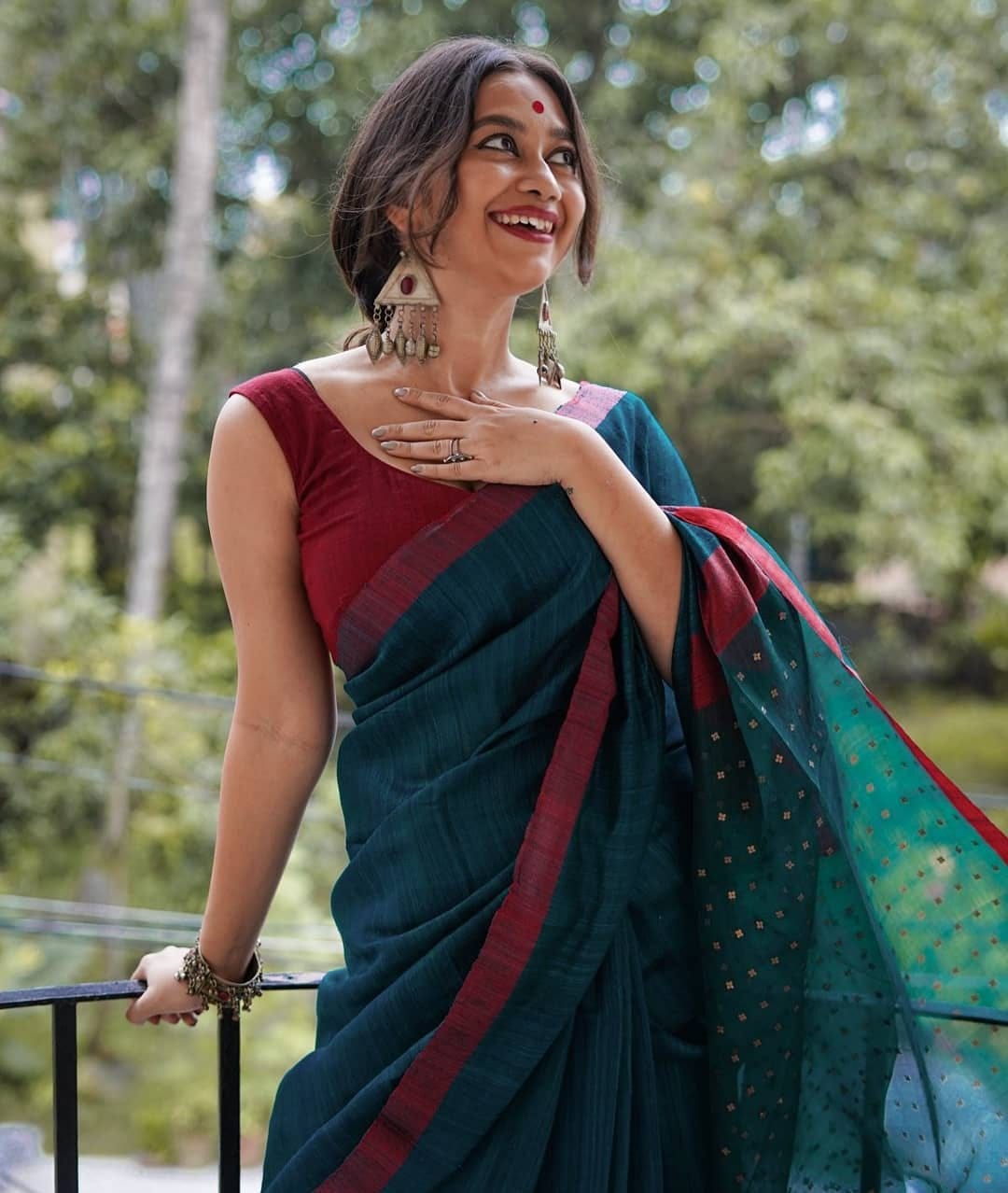 Marvelous Dark Green With Red Woven Border Saree