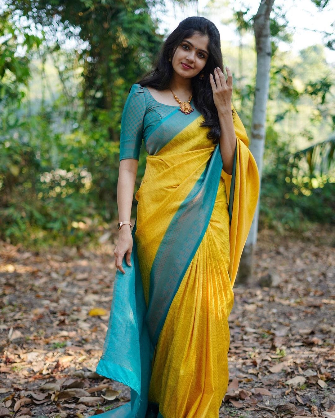 Presenting Yellow Color Saree With Sky Blue Border