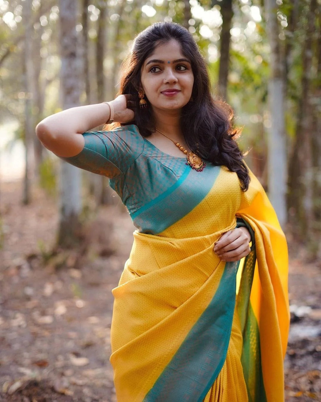 Presenting Yellow Color Saree With Sky Blue Border