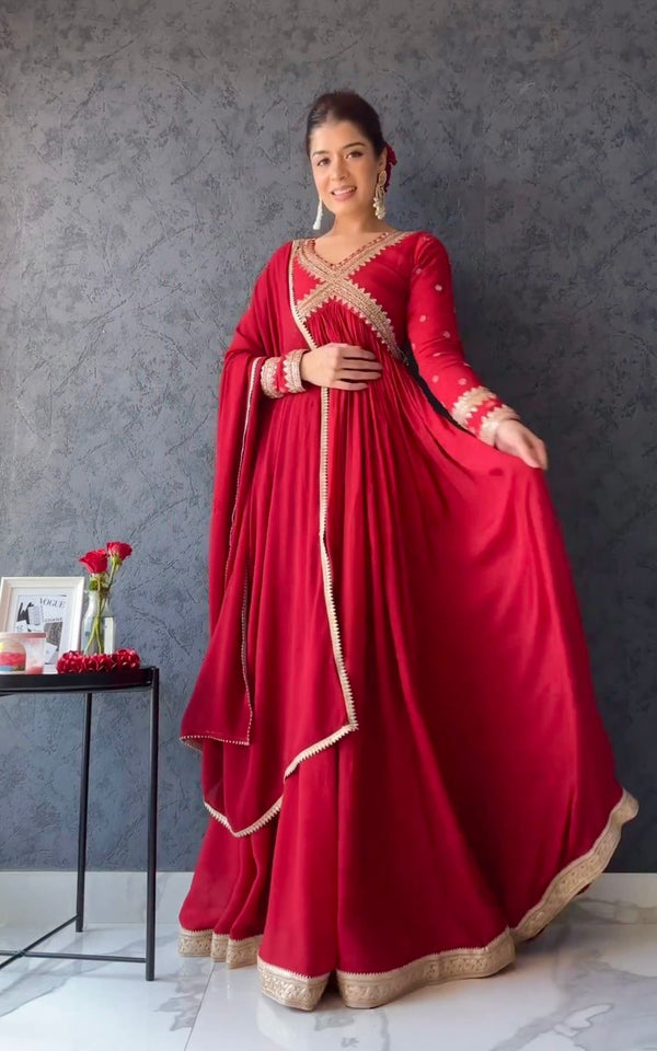 Admiring Red Color Embroidery Work Gown