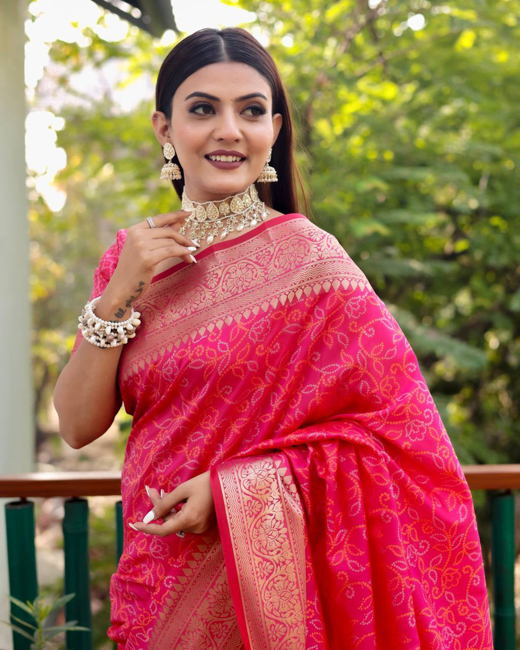 Bandhej Designed Zari Patola Weaving Pink Saree