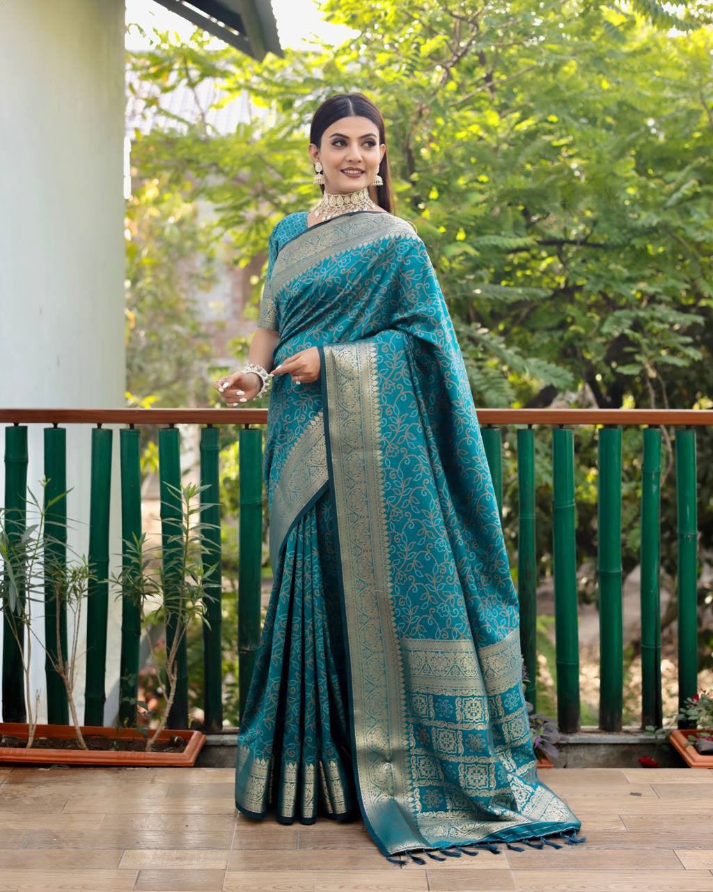 Bandhej Designed Zari Patola Weaving Teal Blue Saree