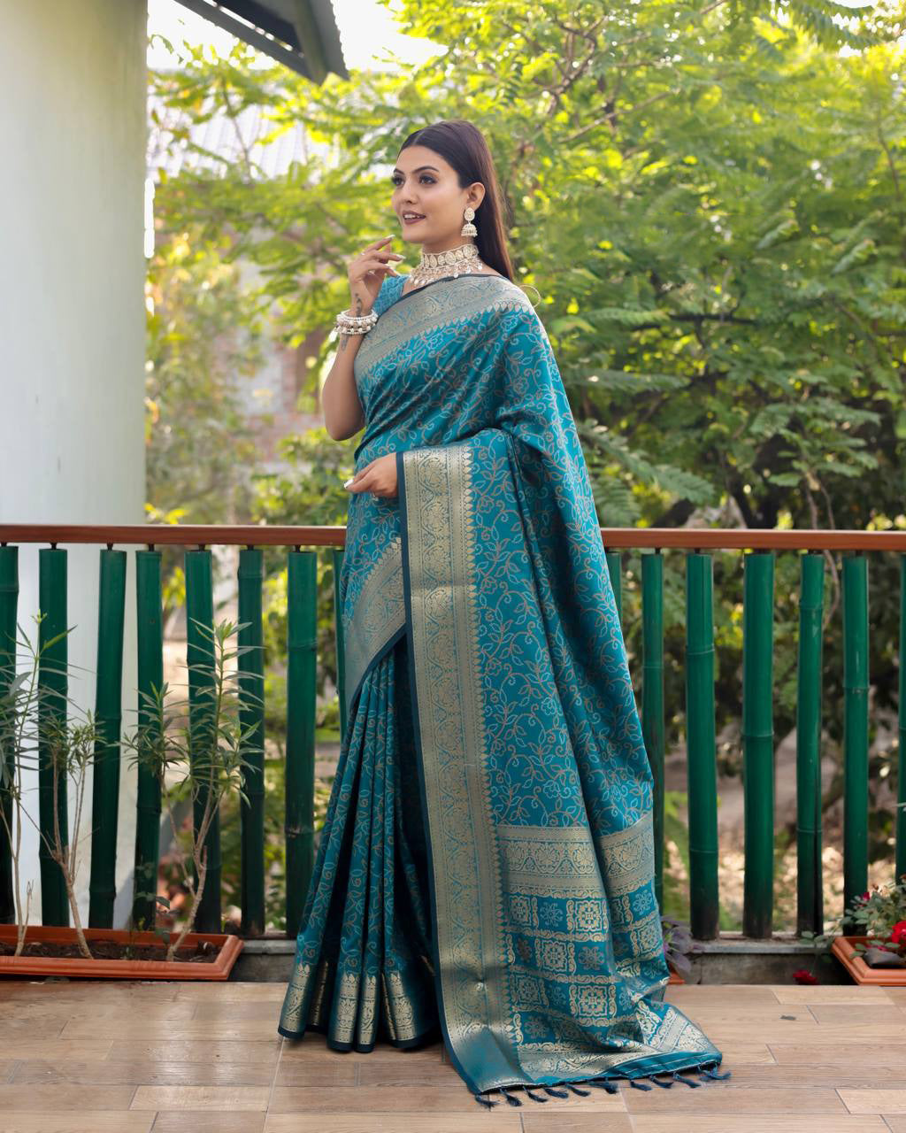 Bandhej Designed Zari Patola Weaving Teal Blue Saree