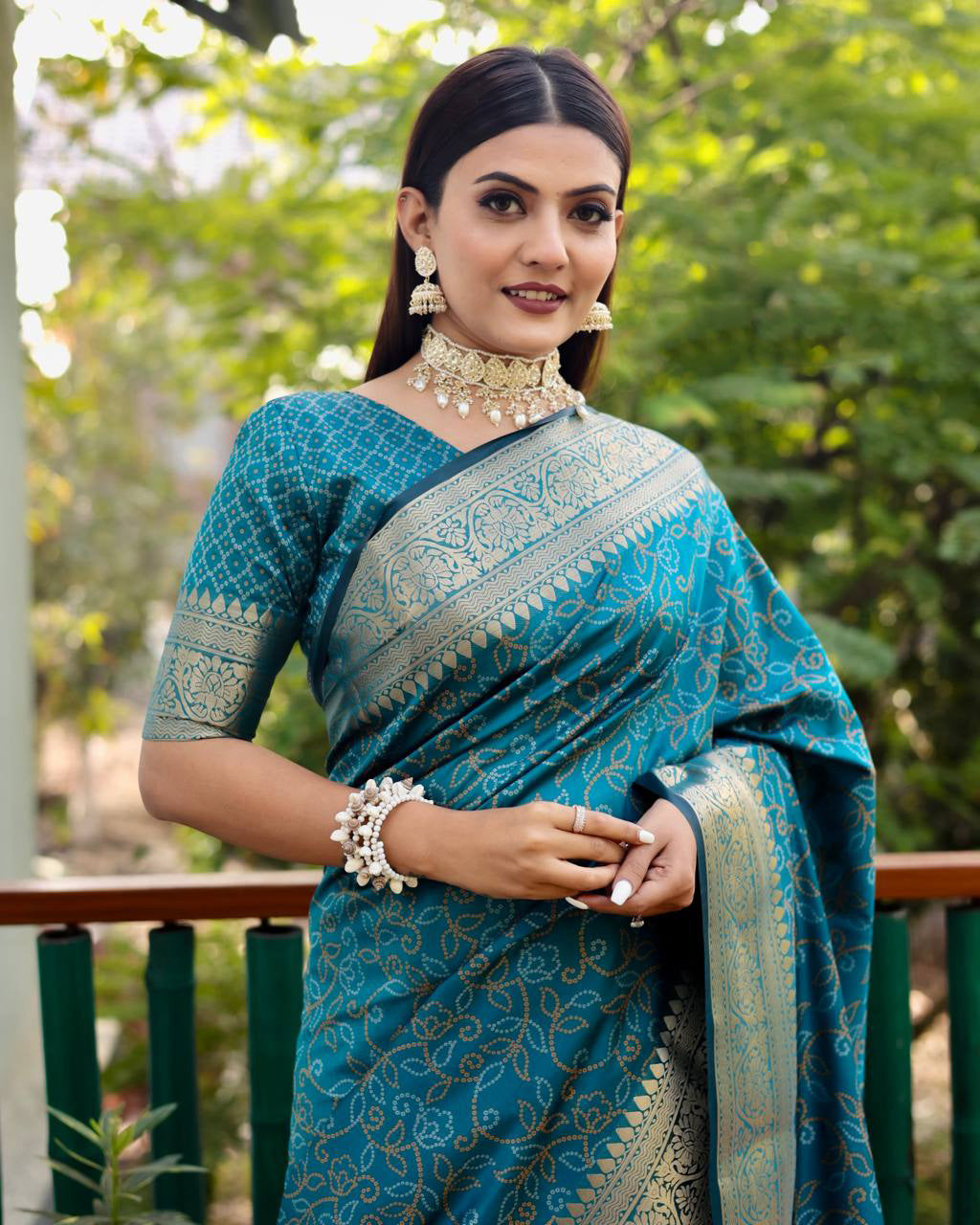 Bandhej Designed Zari Patola Weaving Teal Blue Saree