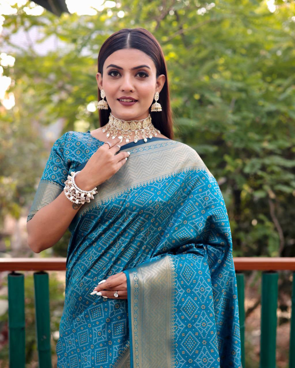 Teal Blue Color Bandini Patola Design Saree