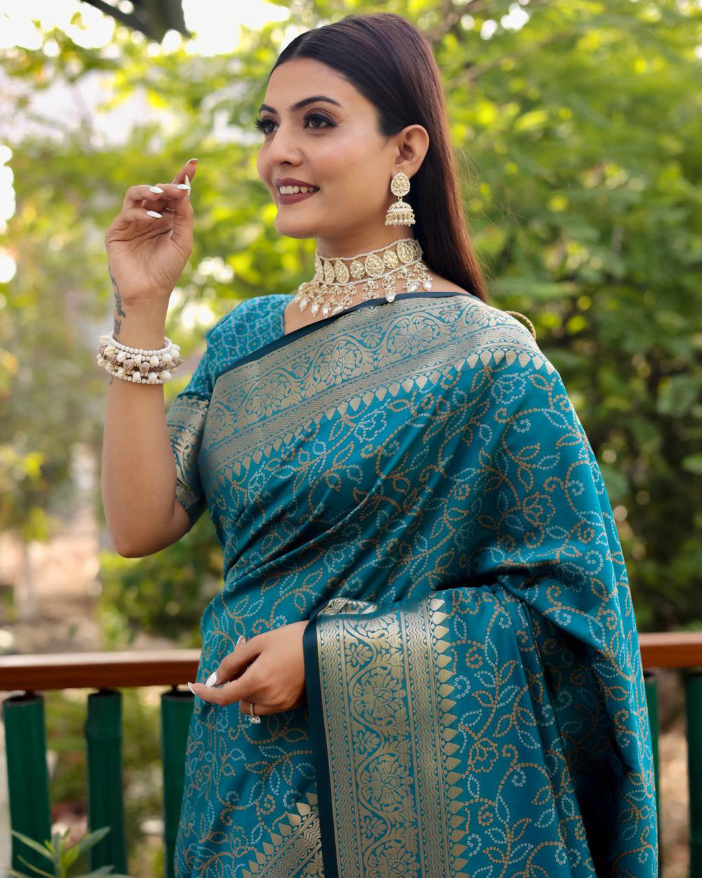 Bandhej Designed Zari Patola Weaving Teal Blue Saree