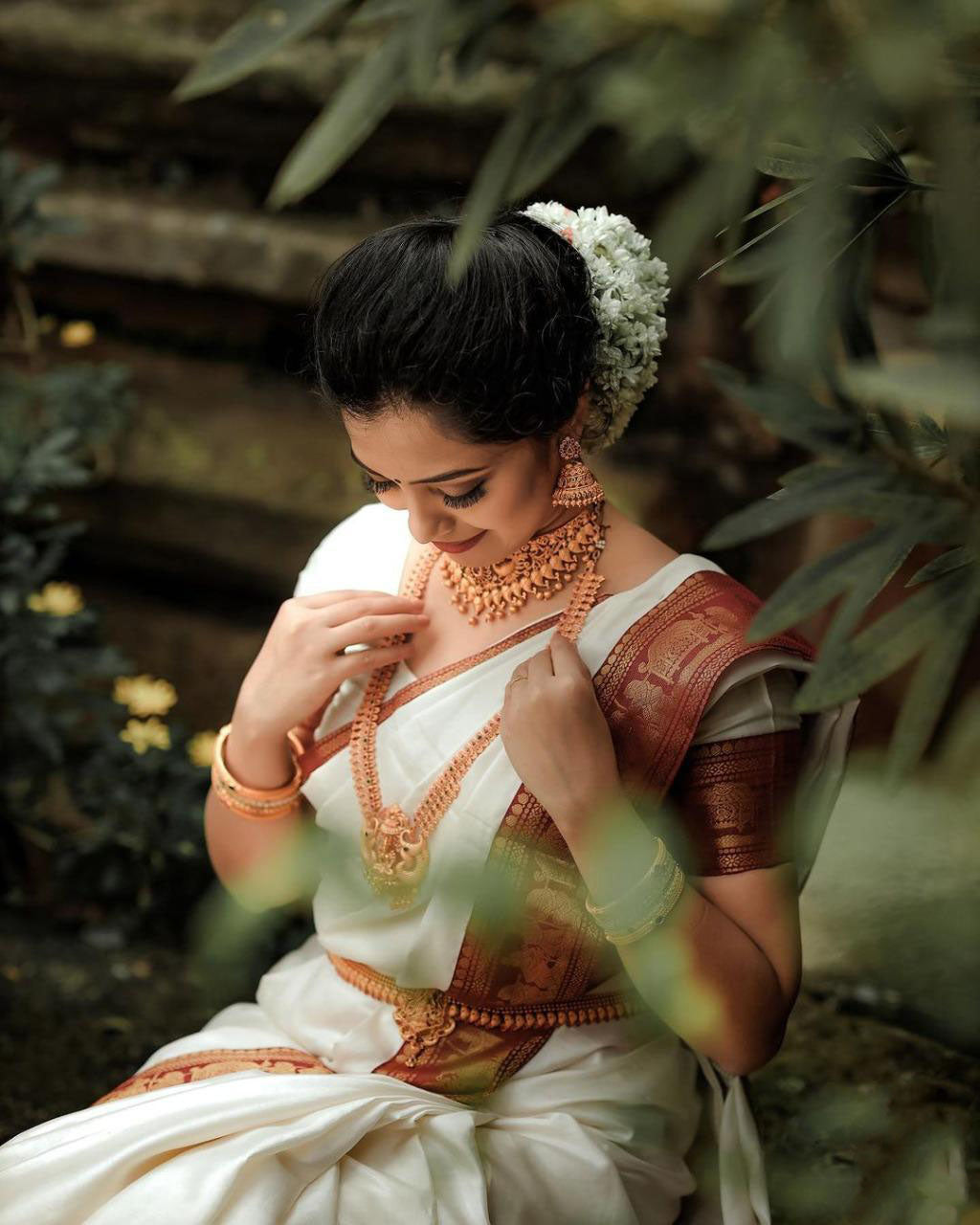 Opulent White Color Soft Lichi Silk Golden Zari Saree
