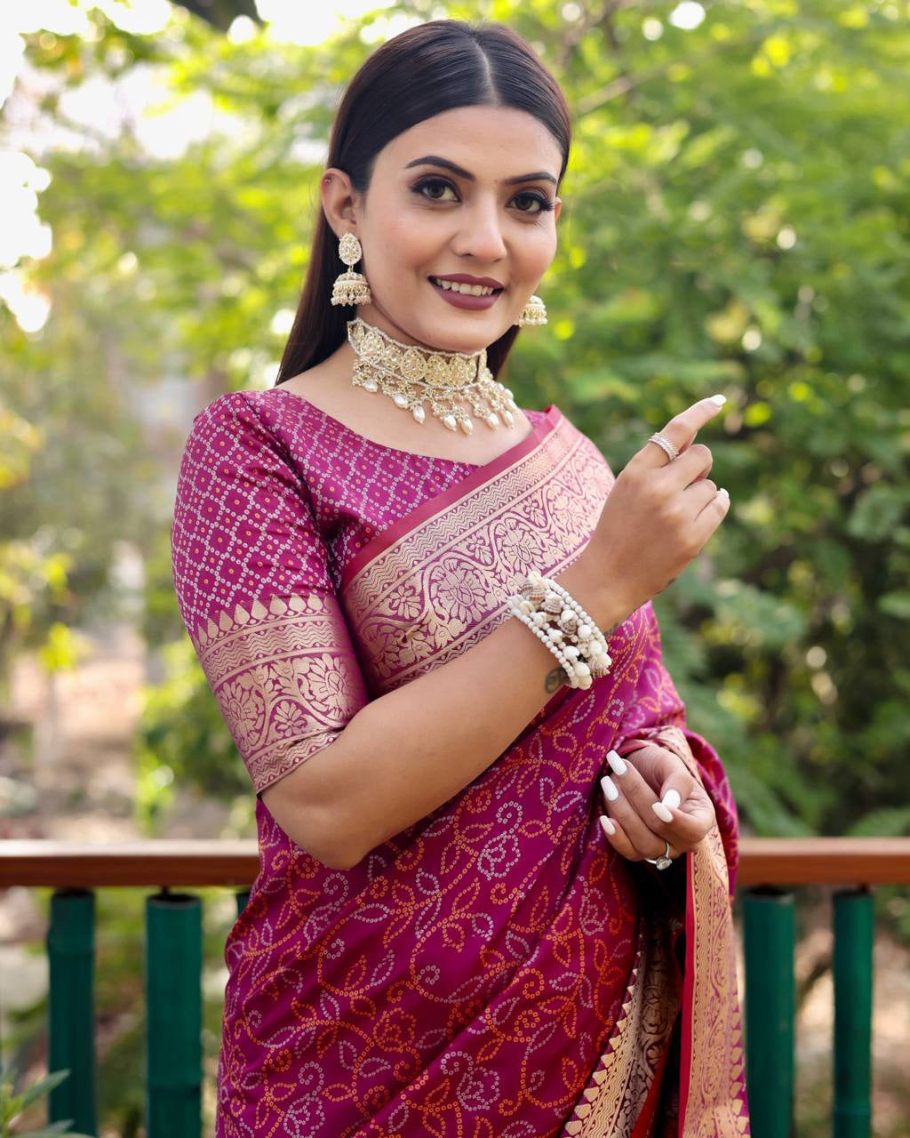 Bandhej Designed Zari Patola Weaving Wine Saree