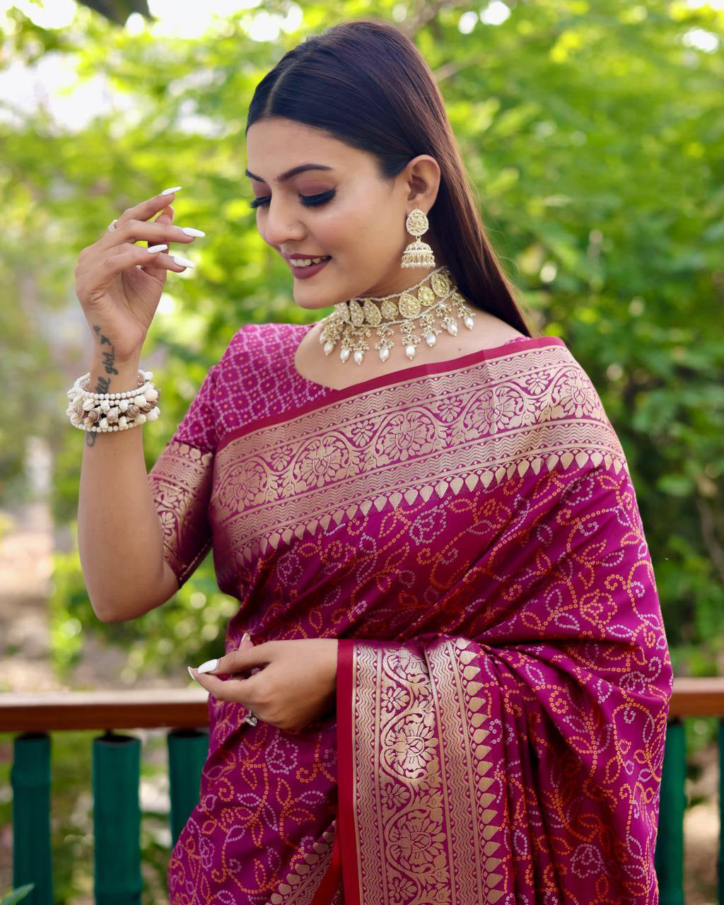 Bandhej Designed Zari Patola Weaving Wine Saree